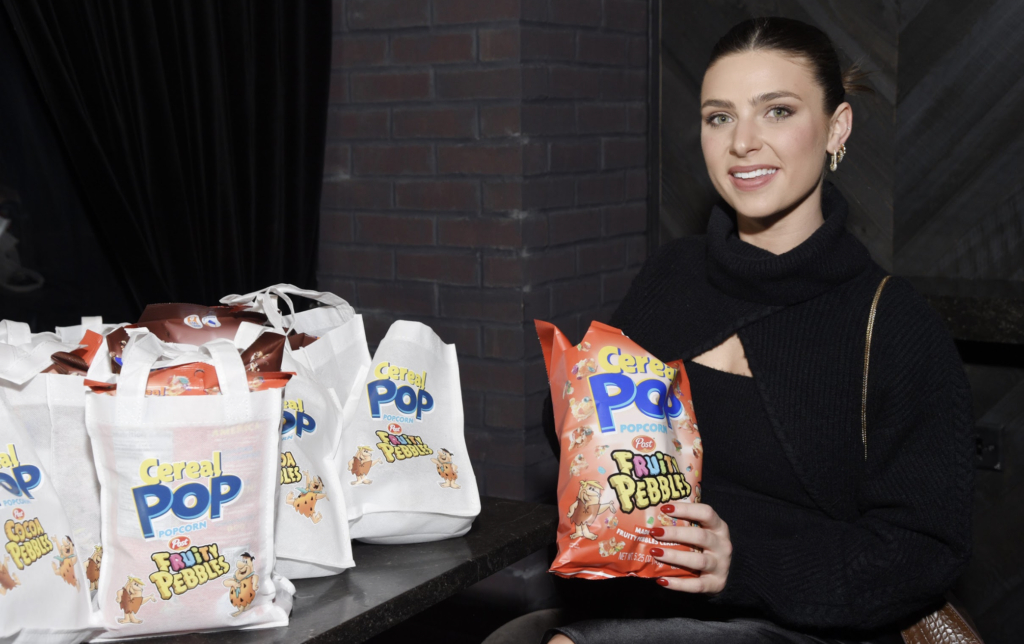 Reality TV star Annie Jorgensen snacks on Cereal Pop with FRUITY PEBBLES® at Black Tap 
