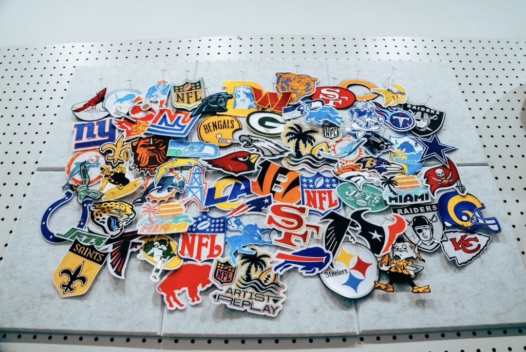 Explore NFL Artist Replay, an art-meets-sport event with the Starter x Alex Yanes collection, panels, and community programming.